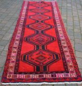 Rich red ground thick pile Persian Meshkin runner 315cm by 116cm