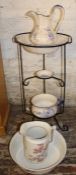 Two part wash bowl sets (one bowl repaired) with wrought iron stand