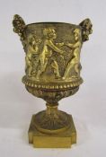 Brass / gilt metal urn with cherub design and removable liner approx. 26.5cm tall