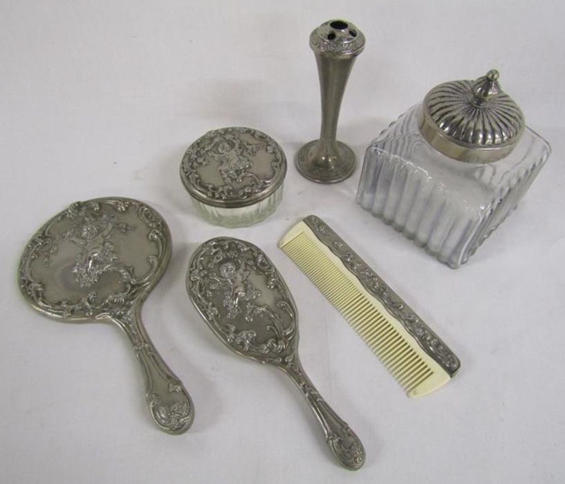 White metal dressing table set with cherub design also a lidded jar and Grenadier silver plate