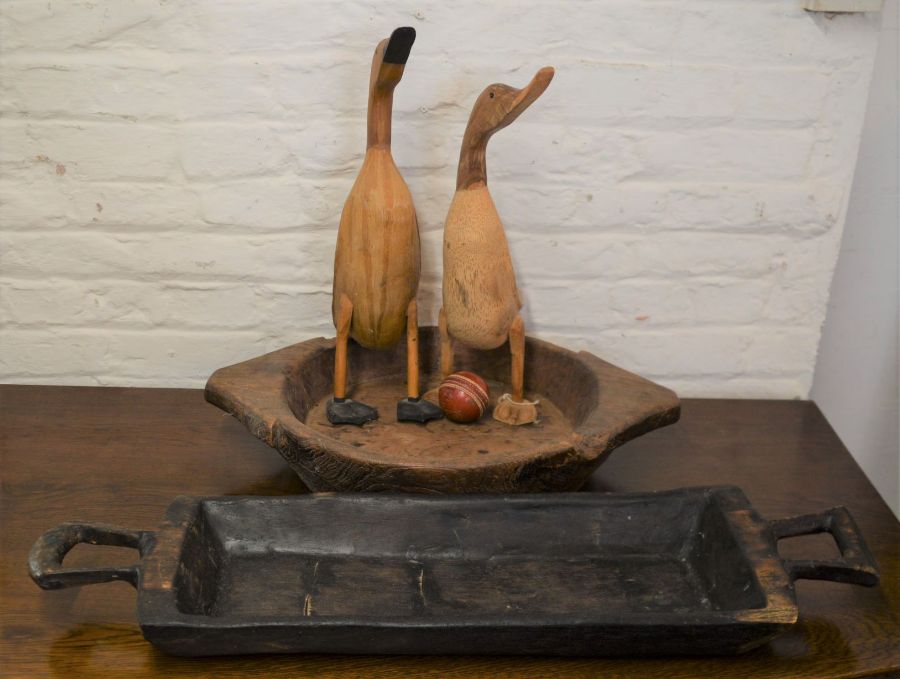 Large carved wooden bowl & a carved rectangular bowl, 2 carved wooden ducks & a cricket ball