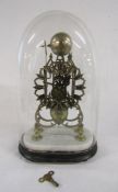 Vintage skeleton clock on marble plinth and a wooden base with glass globe approx. 45cm tall (from
