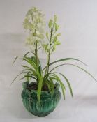 Large faux orchid in a green majolica planter - planter approx. 38cm x 31.5cm tall