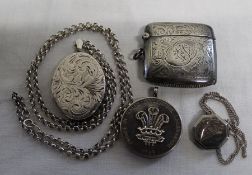 Silver vesta case Birmingham 1922, large silver locket Birmingham 1977 on long belcher chain, Prince