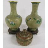 Pair of cloisonné vases depicting flowers and birds on wooden stands approx. 24cm (includes