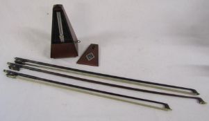 Metronome and 3 violin bows