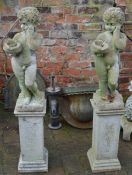 2 concrete cherubs on plinths garden statues approx. 128cm tall