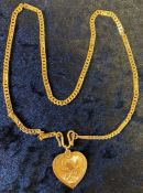 Chinese gold heart shape pendant on a gold chain tested as 18ct. 27g length 42cm