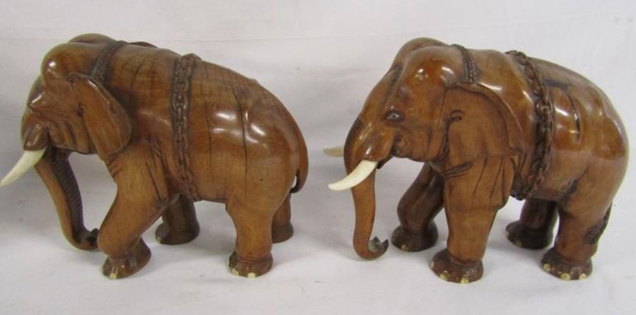 Wooden carved elephants includes a wall hanging head, a pair of elephants (one damaged to ear) - Image 3 of 4