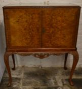 1930's drinks cabinet in burr walnut on cabriole legs