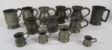 Collection of pewter jugs and tankards