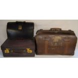 Large leather Gladstone bag, vanity case & a brief case