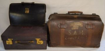 Large leather Gladstone bag, vanity case & a brief case