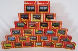 27 x Hornby 00 gauge rolling stock includes Duracell, Shell, Birds, Prime pork etc