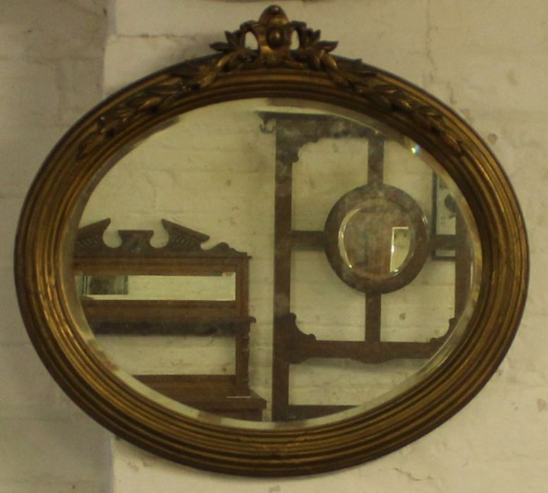Gilt framed oval mirror, 60cm wide