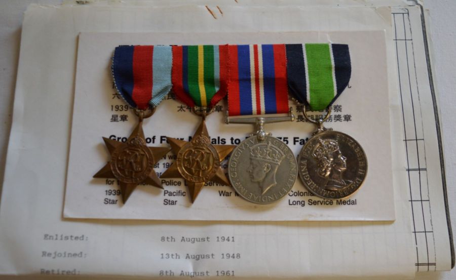 Group of 4 medals on a pin brooch, 1939-45 Star, Pacific Star, British War Medal & Colonial Police