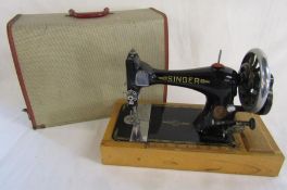 Hand crank Singer sewing machine with bobbin in place