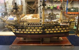 Large cased model of HMS Victory (case size 127cm by 98cm) with Haynes HMS Victory owners workshop