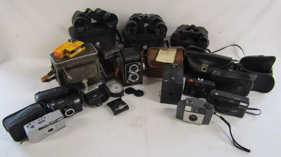 Collection of cameras and binoculars including 'Brownie 127', No.2 Brownie, Prinz Auto Copal-MXV