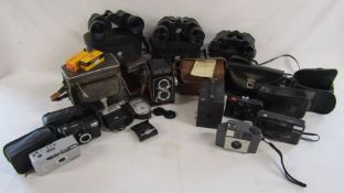 Collection of cameras and binoculars including 'Brownie 127', No.2 Brownie, Prinz Auto Copal-MXV