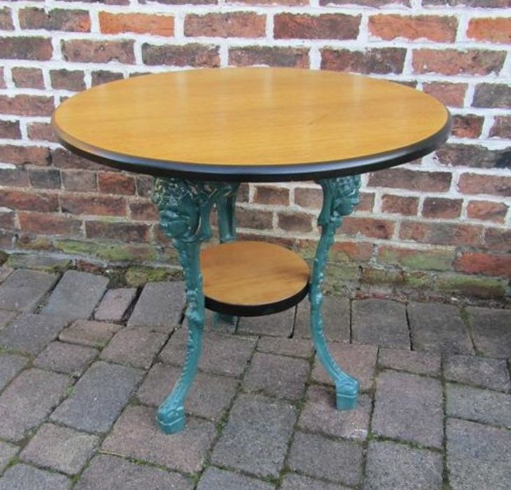 Pub table - cast iron base with lady decoration and wooden top