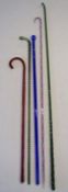 5 glass walking canes - green glass spirally moulded,  thick clear glass with red spiralling, hollow