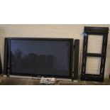 A Very large Panasonic Viera wall mounted 65inch TV with side speakers & wall bracket - model TH-