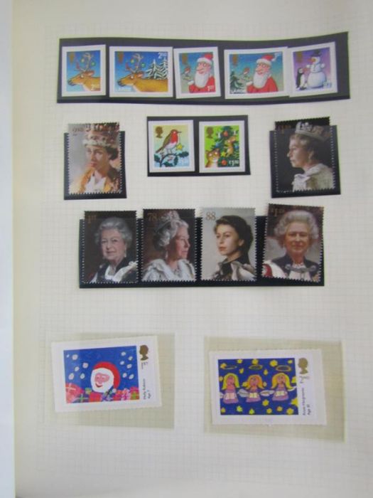 7 albums of stamps from Great Britain and another album of The Channel Islands stamps - Image 16 of 21