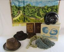 Collection of items including material picture of Great Wall of China, leather menu holders,