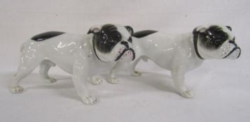 Pfeffer Gotha porcelain bulldogs (one with damaged tail)