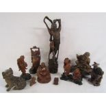 Collection of carved wooden Japanese and Chinese figures includes buddhas, small water buffalo,