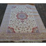 Gold ground full pile cashmere carpet with central medallion 230cm by 160cm