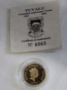 14ct gold Tuvalu Coronation Anniversary Crown 100 dollar coin with certificate of Authenticity no.
