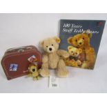 Steiff teddy 111471 Fynn with travelling case - 110238 Lion keyring - and 100 years of Steiff