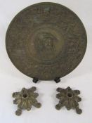 Bronze plaque approx. 31cm dia marked John Albion to rear and a pair of poker stands