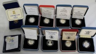 Nine Royal Mint silver proof one pound coins in original boxes of issue (8 with certificates) &