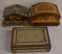 Three inlaid wooden musical boxes