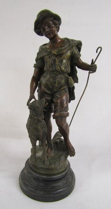 Bronze effect spelter figure on wooden base depicting shepherd boy and his dog - signed F Moreau