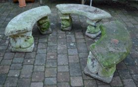 3 curved concrete garden benches on dolphin supports