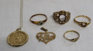 18ct gold ring 2.1g, 9ct gold Nan pendant , two 9ct gold rings 4.1g (stones missing) & tested as