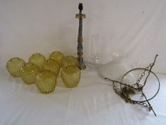 8 orange glass lamp shades, lamp base, oil lamp chimney and brass hanging light with milk glass