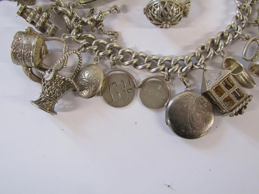 Silver charm bracelet - each link stamped - not all pendants marked - total weight 3.58ozt - Image 3 of 5