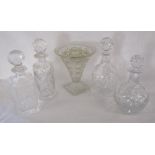 4 decanters and glass vase with insert