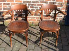 *Pair of early 20th century bent wood office chairs.  This lot is subject to VAT.