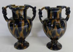 Pair of 2 handled ceramic vases with Whieldon style decoration. 33cm high (one cracked)