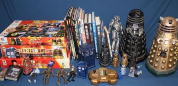 Selection of Dr Who memorabilia including 2 large Daleks, annuals, smaller Daleks, games etc.