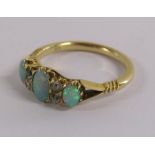 18ct gold diamond and fire opal ring - Ring Size N/O - total weight 3.3g