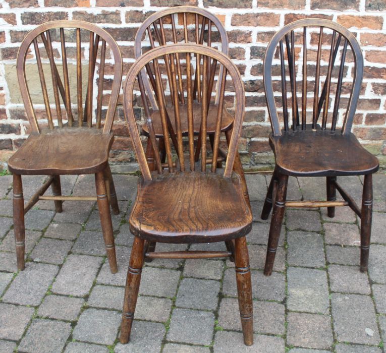 Matched set of 4 wooden hoop back chairs, one marked B Cartwright & Son with Geo V cypher, one