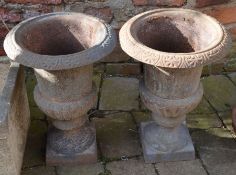Pair of classical cast iron garden urns, Ht 45cm D 33cm