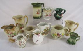 Collection of jugs includes Powell Craft, Ringtons, Germany, Staffordshire, Masons etc